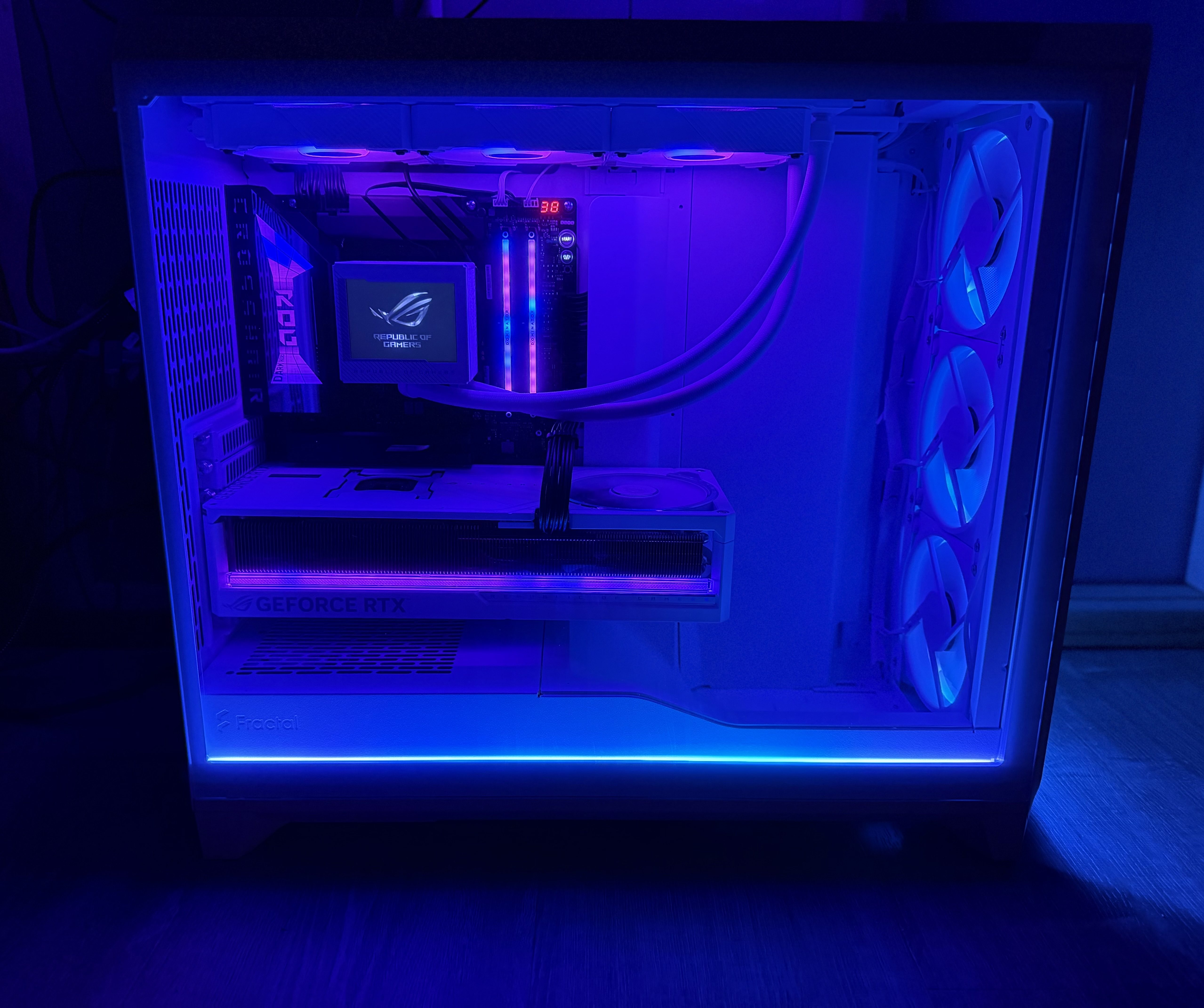 G3ROG-DARK side panel view showing RTX 5090, AIO, and RGB memory